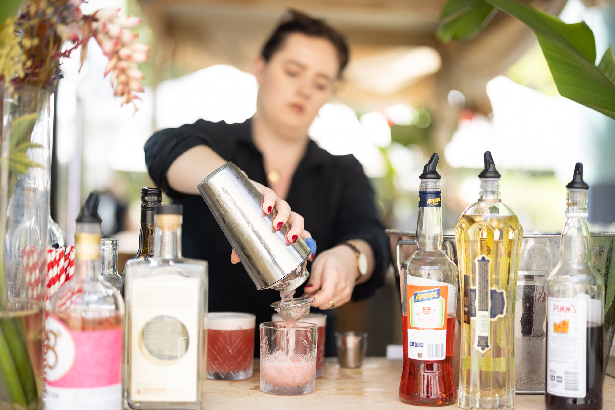 Bartender preparing summer drinks